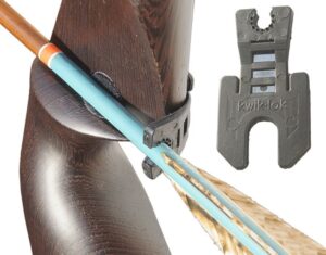 Blue arrow with natural feather fletching on a wooden bow handle.