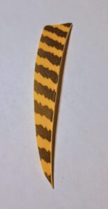 A striped yellow and black object with a zigzag pattern.