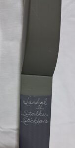 Close-up of a label on a gray fabric item.