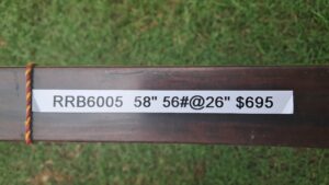 Label on a metal bar with specifications and price.
