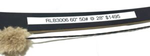 Close-up of a fishing rod showing model and specifications.