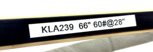 Close-up of a label showing dimensions and code.
