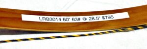 A close-up of an archery bow with specifications on the limb.