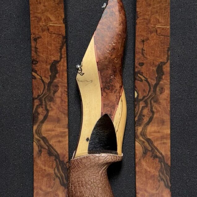 Wooden recurve bow with burl-wood finish